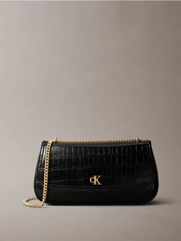 BLACK / ANTIQUE LIGHT GOLD حقيبة كتف بطبعة جلد التمساح بشعار مونوغرام